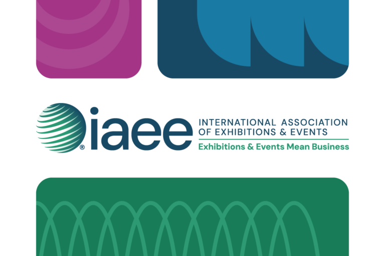 IAEE logo surrounded by curved edge boxes with abstract shapes in green, blue, and pink