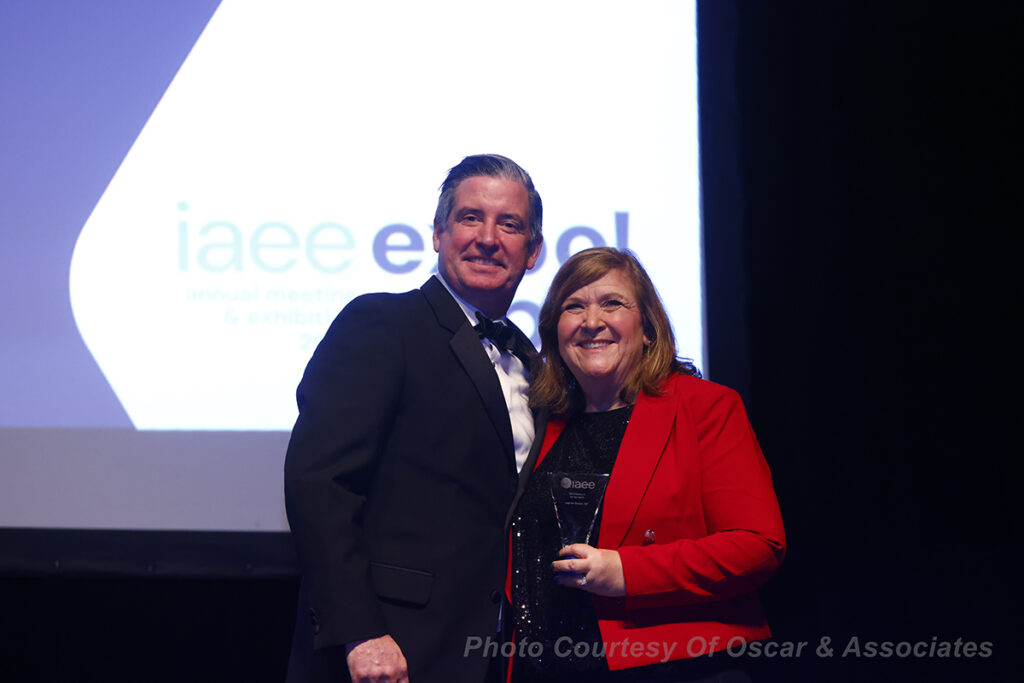 2024 IAEE Awards Committee Chairperson Bob O’Connell presents Leigh Ann Simpson, CMP the IAEE Volunteer of the Year Award at the ceremony held during Expo! Expo! IAEE’s Annual Meeting & Exhibition 2024 in Los Angeles, CA.
