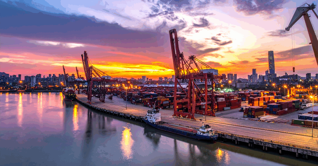 Photo of a large sea port with heavy equipment