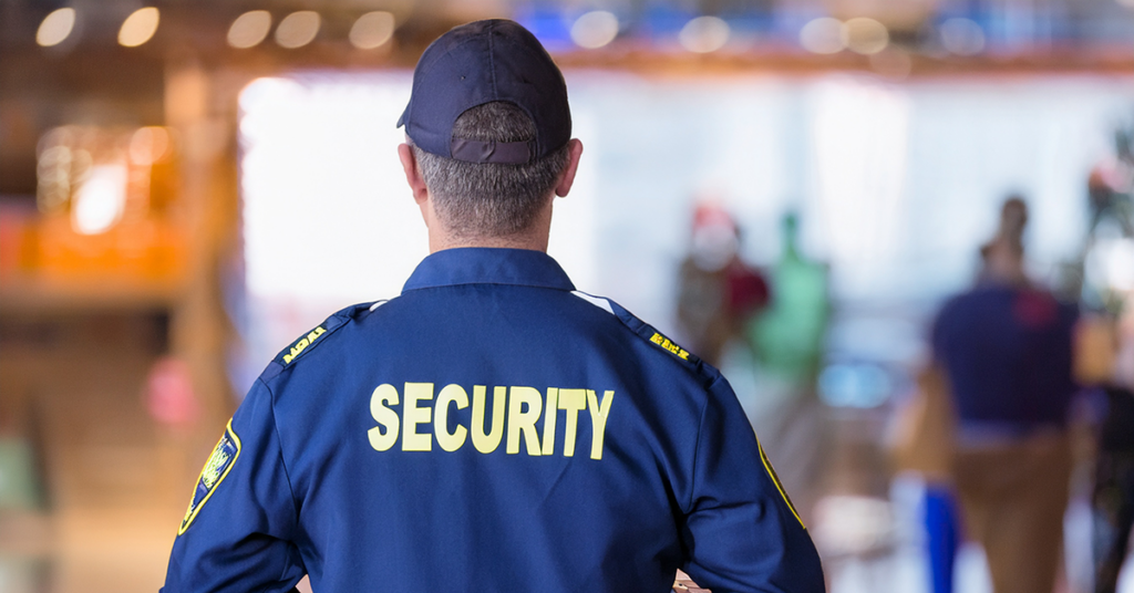 security guard keeps watch at trade show