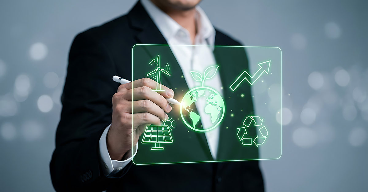 Businessman interacting with green energy and environmental icons representing sustainability, climate action and renewable power solutions.